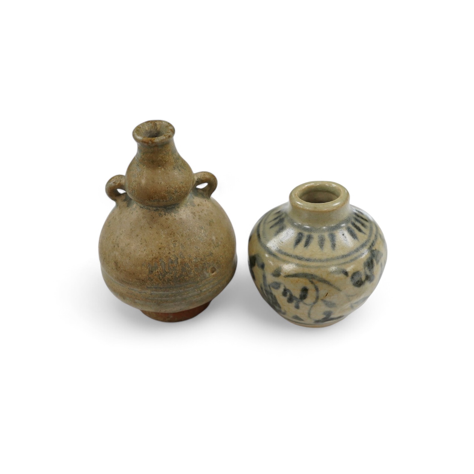 A Chinese blue and white jarlet and a tang dynasty glazed jarlet, 9cm. Condition - commensurate with age